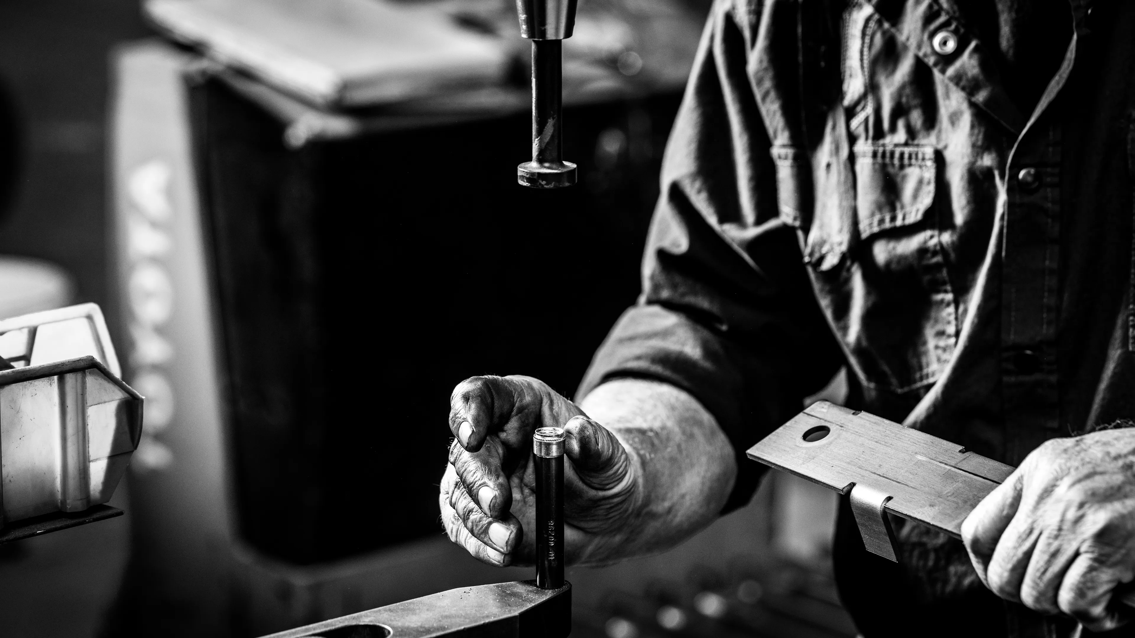 Skilled hands at work, highlighting the expertise behind Baldhead Cabinets' creations.